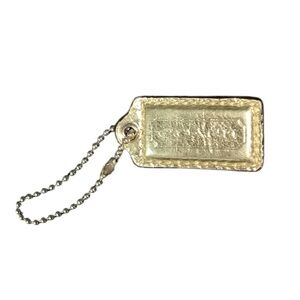 Coach gold leather bag charm keychain